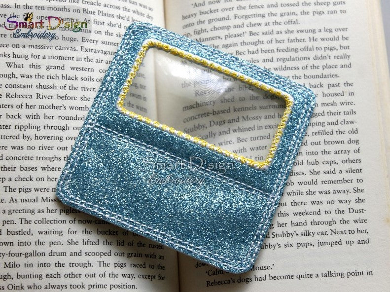 ITH MAGNIFYING BOOKMARK